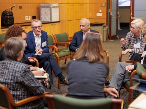 Forum members in discussion