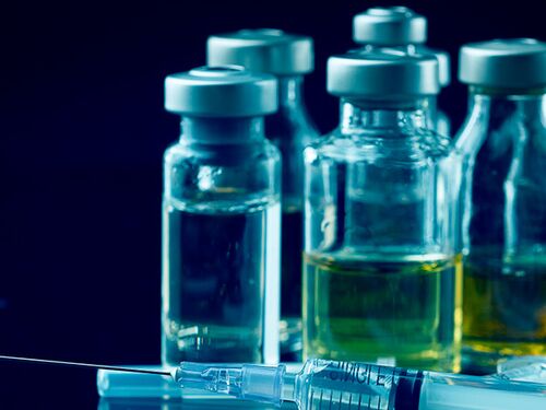 Drug vials and hypodermic needle