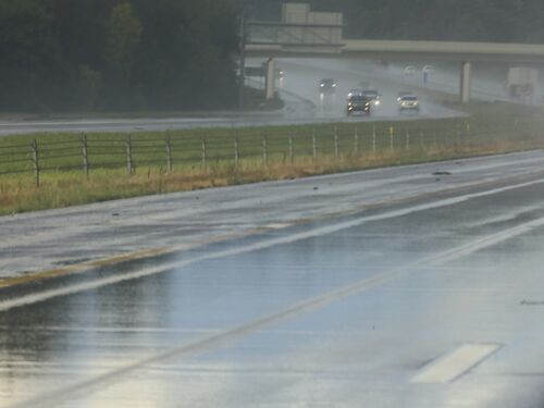 Drenched road from heavy rainfall.