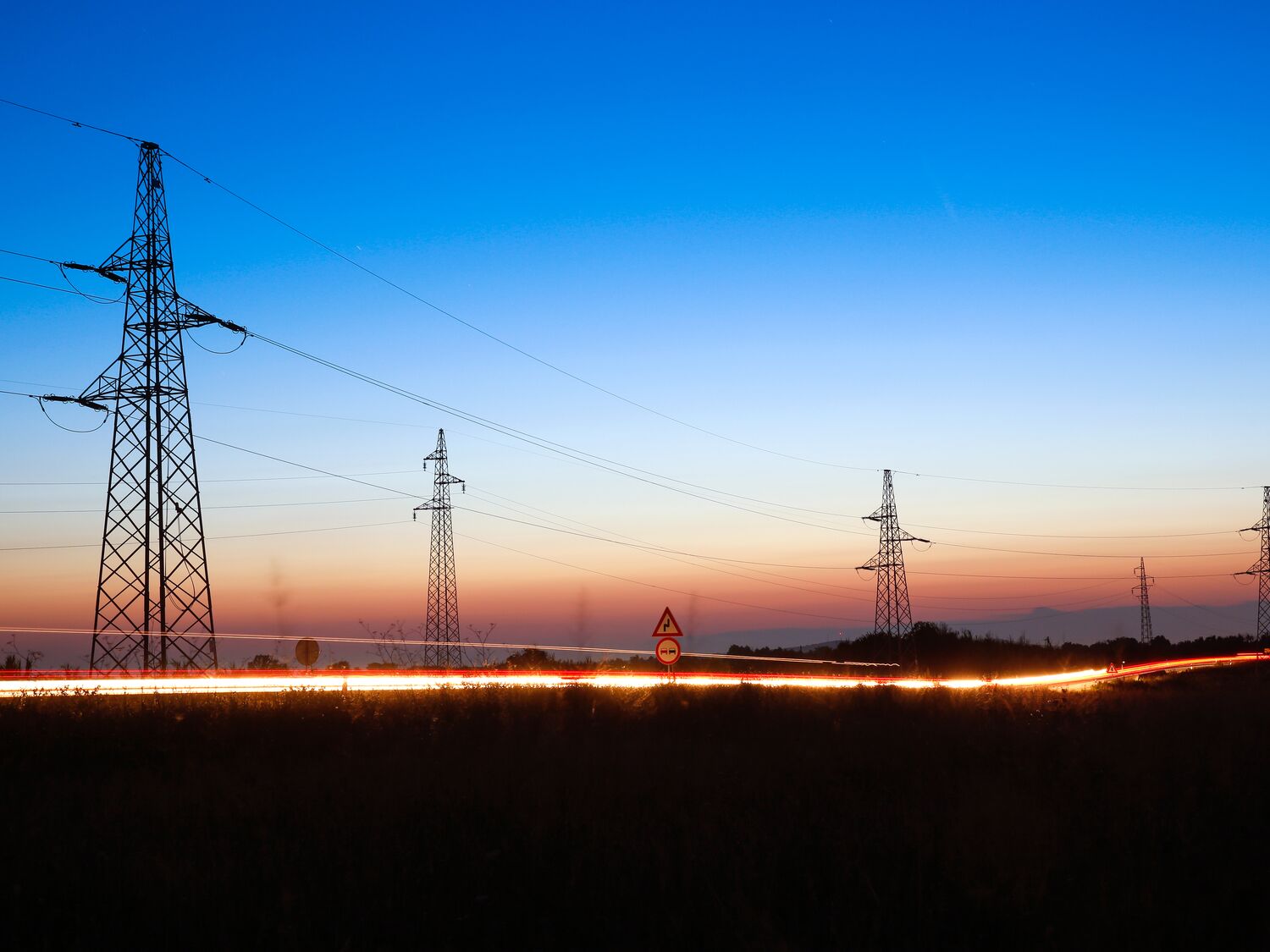 Electrical powerlines at dusk.