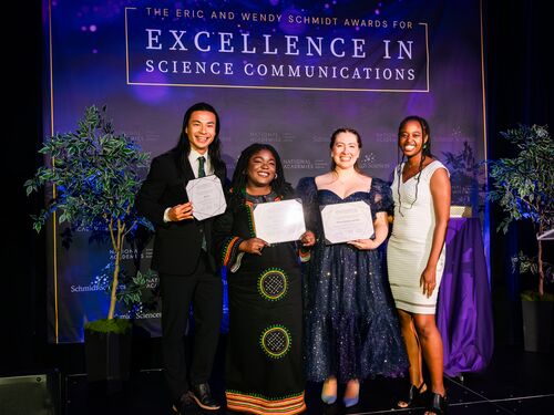 Four winners standing next to each other at the National Academies Eric and Wendy Schmidt Awards for Excellence in Science Communications winning ceremony.