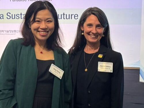 Ying Zhang and Rachel Gallery standing next together posing for a photograph at the conference.