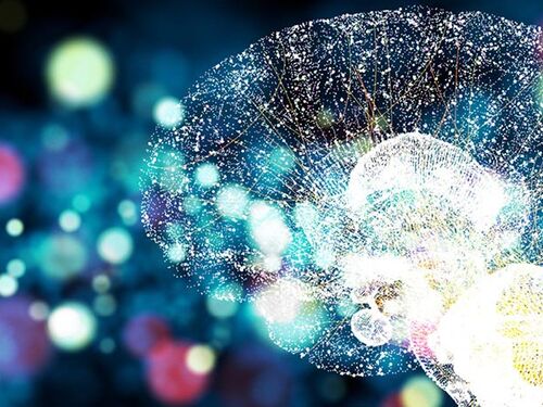 Abstract digital illustration of a human brain made of glowing network-like points and lines, set against a colorful blurred background of light orbs.
