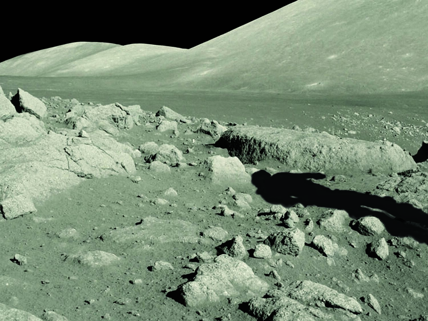 art for the cover of Human Exploration Across the Moon. A graphic composite of a NASA image of the Moon with the Earth and shadow digitally added