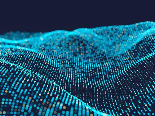 Flowing waves of blue and gold glowing dots forming a digital landscape on a dark background, resembling a dynamic data field or abstract terrain.