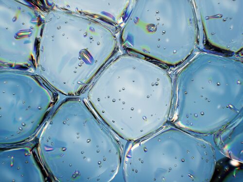 Interconnected transparent glass bubbles, akin to foam bubbles, generate a visually enchanting and captivating effect