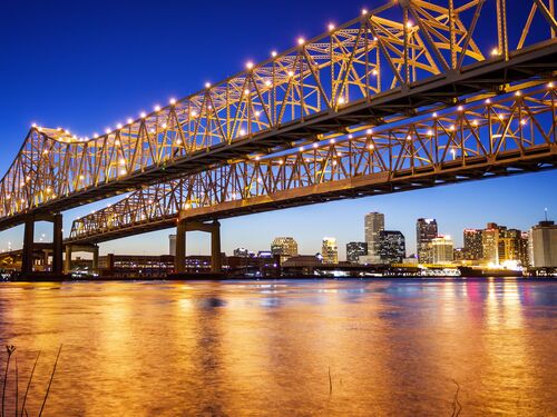 Crescent City Connection Bridge carries traffic over the Mississippi River into New Orleans at night
