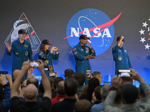 jsc2026e022316 (April 11, 2026) - NASA’s Artemis II crew, NASA astronauts Reid Wiseman, commander; Victor Glover, pilot; Christina Koch, mission specialist; and CSA (Canadian Space Agency) astronaut Jeremy Hansen, shared brief remarks with friends, family, and colleagues after they landed at Ellington Airport near NASA’s Johnson Space Center in Houston on Saturday, April 11, 2026, after a nearly 10-day journey around the Moon and back to Earth. Credit: NASA/Bill Stafford