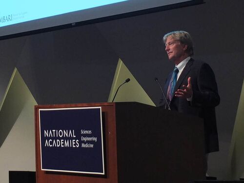 revelle lecture 2025. Christopher Scholin speaking at a podium in the NAS auditorium