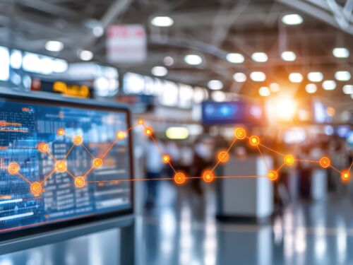 Futuristic airport screen displaying data analytics with travelers in the background, showcasing modern technology and travel efficiency.