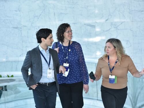 Mariel Lavieri engaging in conversation.