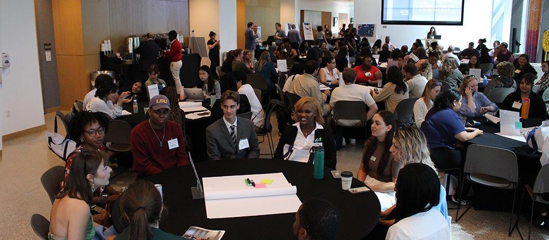 participates in the Gulf Scholars Program meeting