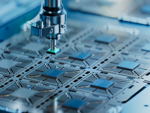 Close-up of Silicon Die are being Extracted from Semiconductor Wafer and Attached to Substrate by Pick and Place Machine. Computer Chip Manufacturing at Fab. Semiconductor Packaging Process.