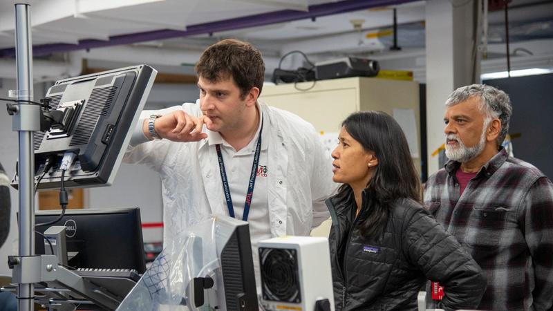 Teddy Tzanetos, MiMi Aung, and Bob Balaram of NASA’s Mars Helicopter project observe as the flight model of the helicopter is tested in the Space Simulator at NASA’s Jet Propulsion Laboratory (credit: NASA/JPL-Caltech)