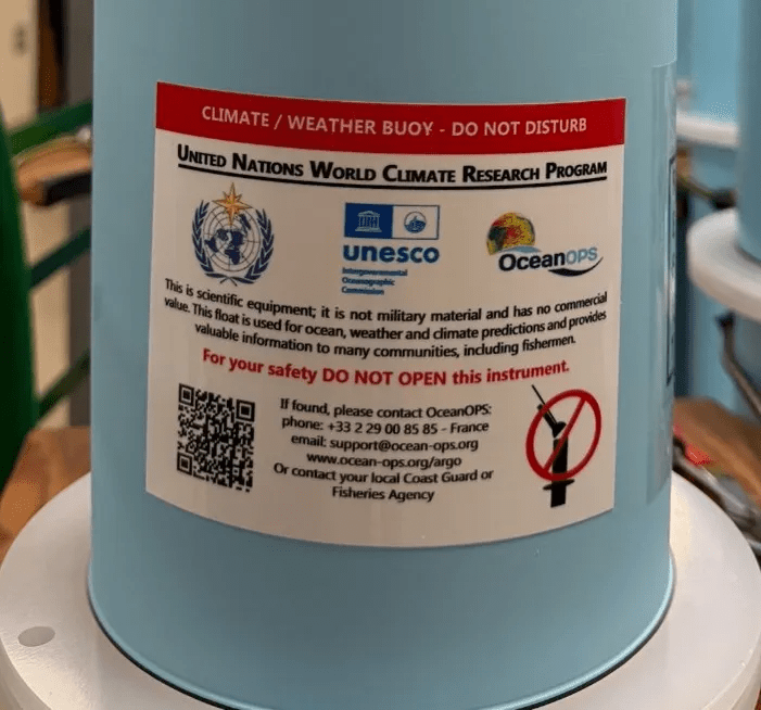 Figure 1. Example of a label on an Argo Float that states that the float is scientific equipment. Image courtesy of Woods Hole Oceanographic Institution